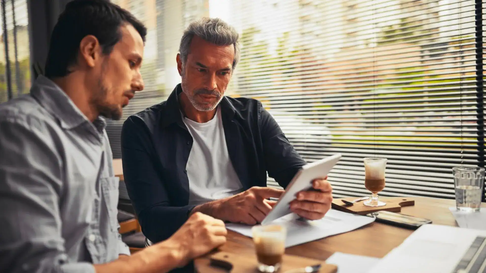 business-selling-discussion-featuring-two-people-in-a-business-setting